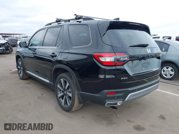 2024 Honda Pilot Touring z VIN 5FNYG1H70RB032368, wystawiony jako IAAI lot #41805758 z przebiegiem 13 078 mil mil oraz . Historia ofert i sprzedaży dostępna na DreamBid. Obrazek 3.