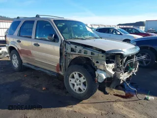 2007 Ford Escape XLT with VIN 1FMCU93167KB89242, listed as a IAAI auction lot 41654083 with 161,847 mi miles. Bid and sale history available at carsss.com. Image 1.