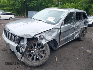 2019 Jeep Grand Cherokee Laredo E with VIN 1C4RJFAG5KC567003, listed as a IAAI auction lot 42390239 with 82,505 mi miles and . Bid and sale history available at DreamBid. Image 17.
