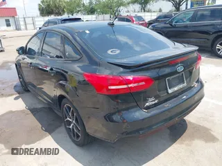 2015 Ford Focus SE with VIN 1FADP3F21FL280550, listed as a IAAI auction lot 42200104 with 146,175 mi miles and . Bid and sale history available at DreamBid. Image 3.