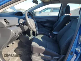 2009 Toyota Yaris with VIN JTDBT903891323833, listed as a Copart auction lot 47460975 with 134,524 mi miles and Salvage Title. Bid and sale history available at DreamBid. Image 7.