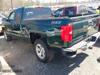 2015 Chevrolet Silverado 1500 LT with VIN 1GCVKREH9FZ189321, listed as a IAAI auction lot 41824789 with 222,984 mi miles. Bid and sale history available at carsss.com. Image 3.
