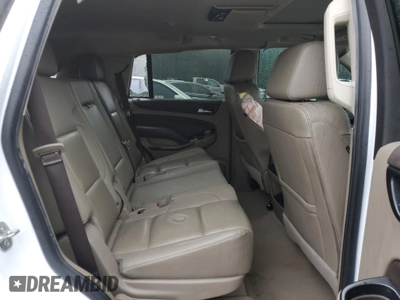2020 Chevrolet Tahoe LT with VIN 1GNSKBKC1LR230885, listed as a Copart auction lot 46532275 with 103,900 mi miles and Salvage title. Bid and sale history available at DreamBid. Image 12.