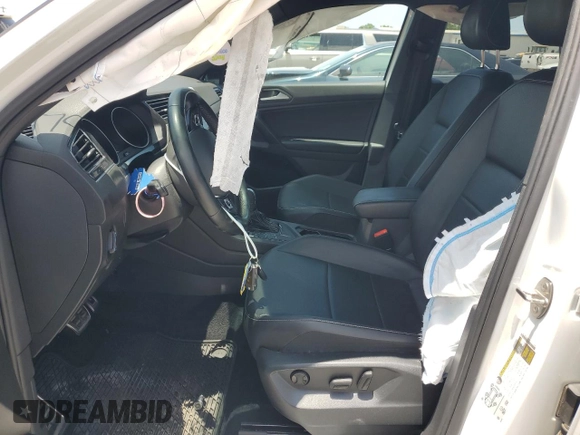 2021 Volkswagen Tiguan SE z VIN 3VV3B7AX0MM137813, wystawiony jako Copart lot #59797985 z przebiegiem 48 958 mil mil oraz Szkoda całkowita • Salvage title. Historia ofert i sprzedaży dostępna na DreamBid. Obrazek 7.