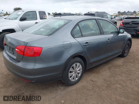 2012 Volkswagen Jetta Sedan S with VIN 3VW2K7AJ7CM309224, listed as a IAAI auction lot 42128641 with 127,702 mi miles. Bid and sale history available at carsss.com. Image 4.