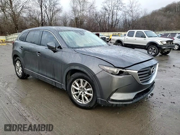 2017 Mazda CX-9 Touring z VIN JM3TCBCY7H0129695, wystawiony jako Copart lot #84193014 z przebiegiem 117 746 mil mil oraz Szkoda całkowita • Salvage title. Historia ofert i sprzedaży dostępna na DreamBid. Obrazek 11.