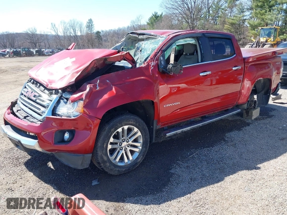2015 GMC Canyon 4WD SLT z VIN 1GTG6CE38F1266466, wystawiony jako IAAI lot #41822501 z przebiegiem 26 479 mil mil oraz . Historia ofert i sprzedaży dostępna na DreamBid. Obrazek 2.