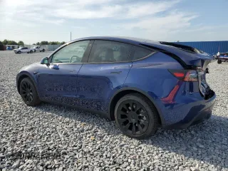 2022 Tesla Model Y Long Range z VIN 7SAYGDEE2NF433907, wystawiony jako Copart lot #54402215 z przebiegiem 44 765 mil mil oraz Szkody całkowita. Historia ofert i sprzedaży dostępna na DreamBid. Obrazek 2.