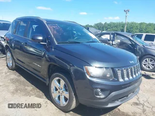 2015 Jeep Compass Latitude with VIN 1C4NJCEBXFD179373, listed as a IAAI auction lot 39380614 with 104,832 mi miles. Bid and sale history available at carsss.com. Image 1.