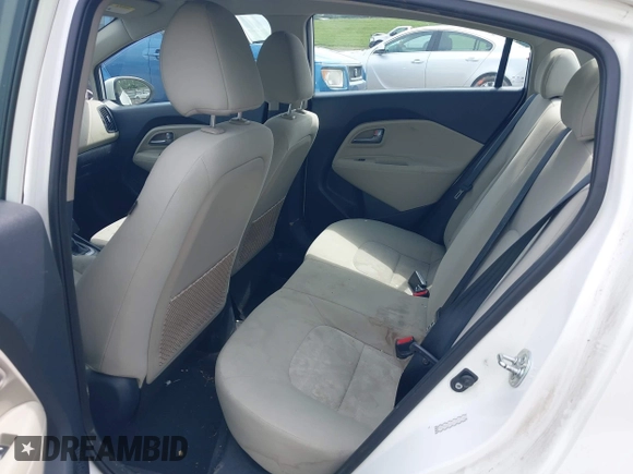 2013 Kia Rio LX with VIN KNADM4A39D6318169, listed as a IAAI auction lot 42063285 with 138,272 mi miles and . Bid and sale history available at DreamBid. Image 8.