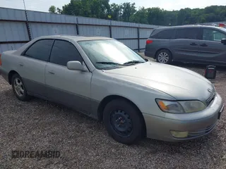 1998 Lexus ES 300 with VIN JT8BF28G9W5016146, listed as a IAAI auction lot 42672230 with 303,819 mi miles and . Bid and sale history available at DreamBid. Image 1.