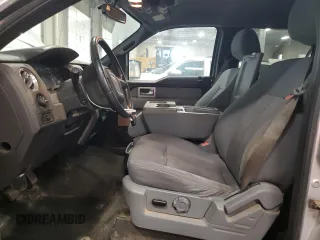 2011 Ford F-150 XLT with VIN 1FTFW1ET3BFC87187, listed as a Copart auction lot 61072695 with 156,365 mi miles and Salvage title. Bid and sale history available at DreamBid. Image 7.