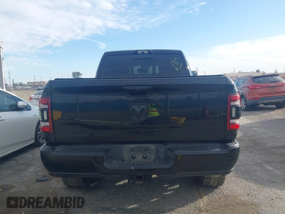 2021 Ram 2500 Laramie z VIN 3C6UR5FL7MG590681, wystawiony jako IAAI lot #41679165 z przebiegiem 28 482 mil mil oraz . Historia ofert i sprzedaży dostępna na DreamBid. Obrazek 16.