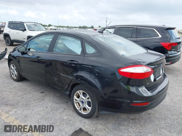 2015 Ford Fiesta SE with VIN 3FADP4BJ5FM130099, listed as a IAAI auction lot 42126960 with 82,299 mi miles and . Bid and sale history available at DreamBid. Image 3.