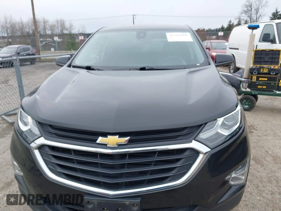 2020 Chevrolet Equinox LT z VIN 2GNAXKEV5L6142198, wystawiony jako IAAI lot #41765650 z przebiegiem 131 946 mil mil oraz . Historia ofert i sprzedaży dostępna na DreamBid. Obrazek 13.