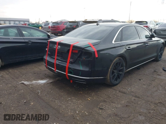 2015 Audi A8 L 4.0T with VIN WAU32AFD5FN026108, listed as a IAAI auction lot 41652860 with 148,253 mi miles. Bid and sale history available at carsss.com. Image 4.
