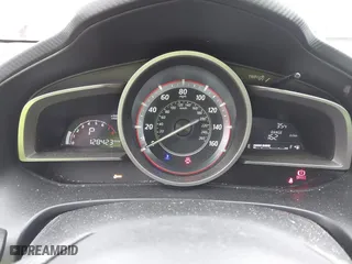 2016 Mazda Mazda3 i Grand Touring with VIN 3MZBM1N77GM245567, listed as a IAAI auction lot 41330883 with 128,423 mi miles. Bid and sale history available at carsss.com. Image 7.