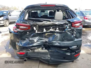 2023 Mazda CX-9 Touring Plus with VIN JM3TCBAY2P0657761, listed as a IAAI auction lot 41125586 with 12,425 mi miles and . Bid and sale history available at DreamBid. Image 6.