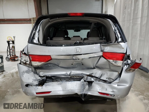 2017 Honda Odyssey EX-L with VIN 5FNRL5H65HB014638, listed as a Copart auction lot 48861475 with 97,788 mi miles and Salvage Title. Bid and sale history available at DreamBid. Image 6.