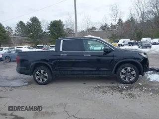 2018 Honda Ridgeline RTL-E z VIN 5FPYK3F78JB002172, wystawiony jako IAAI lot #41528764 z przebiegiem 64 566 mil mil oraz . Historia ofert i sprzedaży dostępna na DreamBid. Obrazek 14.