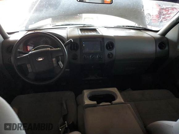 2005 Ford F-150 STX with VIN 1FTRX12W25NA37703, listed as a Copart auction lot 60089325 with 128,651 mi miles and Salvage title. Bid and sale history available at DreamBid. Image 8.