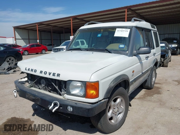 2000 Land Rover Discovery Cloth z VIN SALTY124XYA262828, wystawiony jako IAAI lot #41769729 z przebiegiem 215 711 mil mil oraz . Historia ofert i sprzedaży dostępna na DreamBid. Obrazek 18.