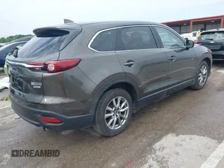 2017 Mazda CX-9 Touring z VIN JM3TCACY7H0129335, wystawiony jako IAAI lot #42289926 z przebiegiem 60 425 mil mil oraz . Historia ofert i sprzedaży dostępna na DreamBid. Obrazek 4.
