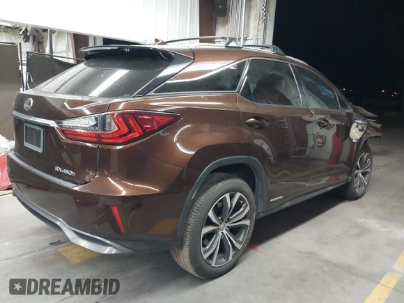 2016 Lexus RX 450h with VIN 2T2BGMCA1GC005462, listed as a IAAI auction lot 42304457 with 87,248 mi miles and . Bid and sale history available at DreamBid. Image 4.