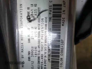 2012 Mazda 3 i Grand Touring with VIN JM1BL1M7XC1659084, listed as a Copart auction lot 49064185 with 104,883 mi miles and Salvage Title. Bid and sale history available at DreamBid. Image 13.