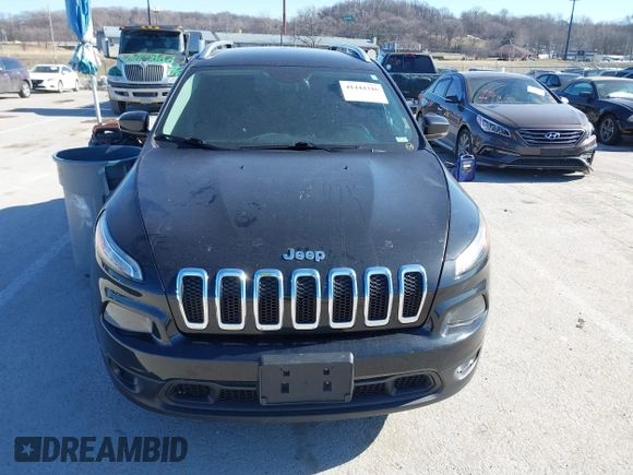 2016 Jeep Cherokee Latitude with VIN 1C4PJLCB8GW330017, listed as a IAAI auction lot 41444346 with 354,212 mi miles. Bid and sale history available at carsss.com. Image 12.