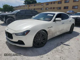 2015 Maserati Ghibli S Q4 with VIN ZAM57RTA5F1147830, listed as a Copart auction lot 61824985 with 89,828 mi miles and Clean title. Bid and sale history available at DreamBid. Image 1.