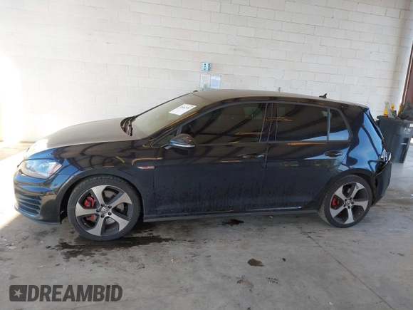 2015 Volkswagen Golf GTI Autobahn w/Performance Pkg with VIN 3VW447AU3FM100063, listed as a IAAI auction lot 41402553 with 70,797 mi miles. Bid and sale history available at carsss.com. Image 14.