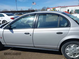 1999 Saturn SL z VIN 1G8ZH5281XZ376254, wystawiony jako IAAI lot #41857372 z przebiegiem 229 836 mil mil oraz . Historia ofert i sprzedaży dostępna na DreamBid. Obrazek 14.