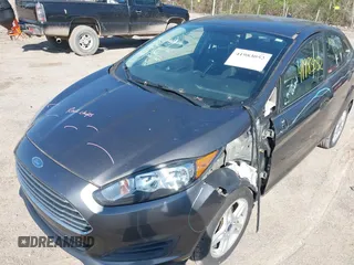 2017 Ford Fiesta SE with VIN 3FADP4BJ0HM117117, listed as a IAAI auction lot 41983052 with 99,186 mi miles. Bid and sale history available at carsss.com. Image 6.