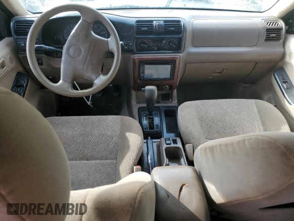 2002 Isuzu Rodeo S z VIN 4S2CK58W024333487, wystawiony jako Copart lot #76361854 z przebiegiem Nie podano mil oraz Nie do naprawy • Non repairable. Historia ofert i sprzedaży dostępna na DreamBid. Obrazek 8.