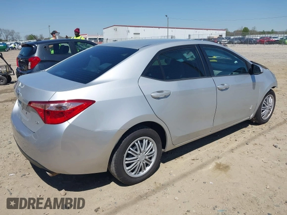 2019 Toyota Corolla L with VIN 2T1BURHEXKC163703, listed as a IAAI auction lot 41870512 with 131,153 mi miles. Bid and sale history available at carsss.com. Image 4.