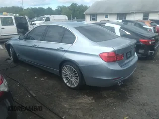 2013 BMW 3 Series 328i with VIN WBA3A5G54DNP25843, listed as a IAAI auction lot 39515836 with 104,045 mi miles. Bid and sale history available at carsss.com. Image 3.