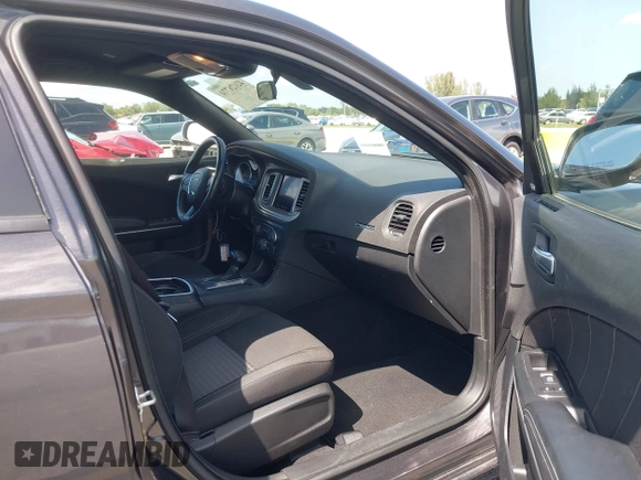 2023 Dodge Charger SXT with VIN 2C3CDXBG0PH571518, listed as a IAAI auction lot 42026774 with 47,394 mi miles and . Bid and sale history available at DreamBid. Image 5.