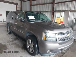 2014 Chevrolet Suburban LTZ with VIN 1GNSCKE02ER144177, listed as a IAAI auction lot 42727544 with 240,952 mi miles and . Bid and sale history available at DreamBid. Image 1.