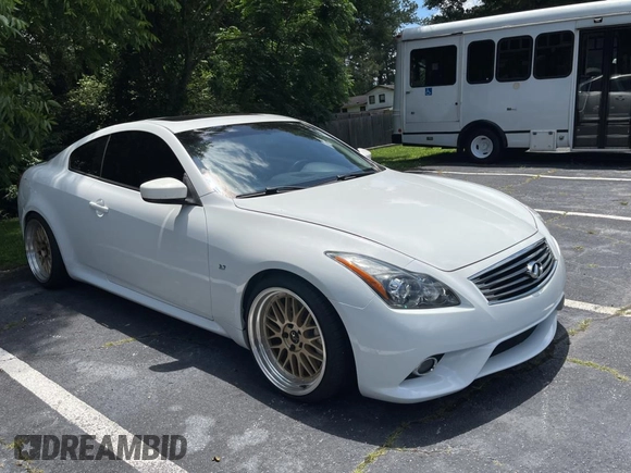 2014 Infiniti Q60 Journey с VIN JN1CV6EKXEM110777, выставлен на аукционе Copart как лот 60266245 с пробегом 128 272 миль миль и Чистый • Clean title. История ставок и продаж доступна на DreamBid. Изображение 1.