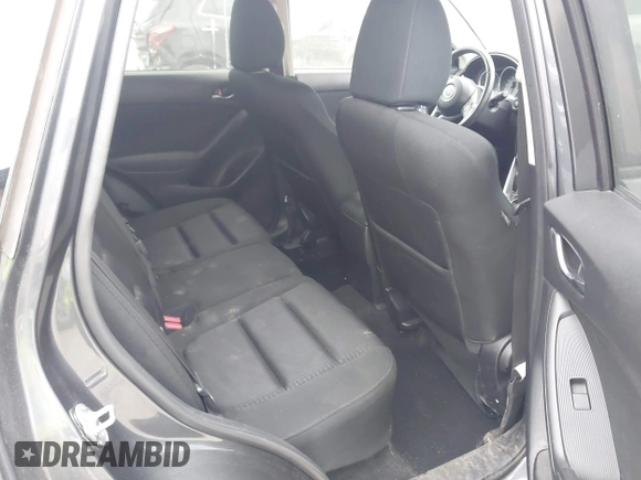 2015 Mazda CX-5 Touring with VIN JM3KE4CY1F0439016, listed as a IAAI auction lot 42039259 with 201,325 mi miles and . Bid and sale history available at carsss.com. Image 8.