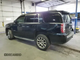 2015 GMC Yukon SLE with VIN 1GKS2AKC6FR229744, listed as a Copart auction lot 88270295 with 215,762 mi miles and Salvage Title. Bid and sale history available at DreamBid. Image 2.