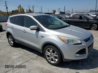 2013 Ford Escape SEL with VIN 1FMCU9H98DUB01757, listed as a Copart auction lot 63626185 with 189,695 mi miles and Clean title. Bid and sale history available at DreamBid. Image 4.