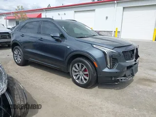 2021 Cadillac XT4 AWD Sport with VIN 1GYFZFR40MF032839, listed as a IAAI auction lot 42543838 with 46,371 mi miles and . Bid and sale history available at DreamBid. Image 1.