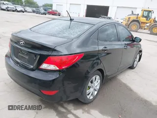 2013 Hyundai Accent GLS with VIN KMHCU4AE4DU422690, listed as a IAAI auction lot 39169185 with 138,438 mi miles. Bid and sale history available at carsss.com. Image 4.