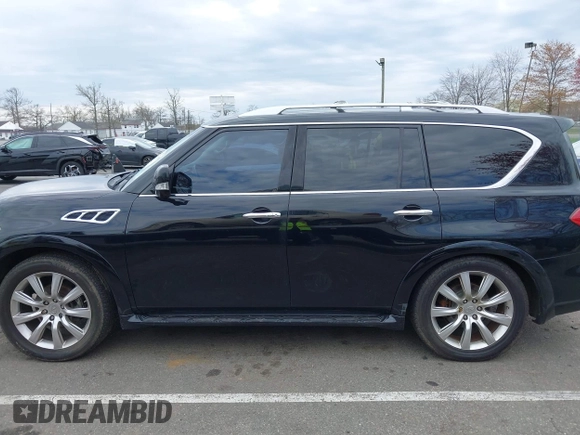 2012 Infiniti QX56 7-passenger z VIN JN8AZ2NEXC9020609, wystawiony jako IAAI lot #42026235 z przebiegiem 168 109 mil mil oraz . Historia ofert i sprzedaży dostępna na DreamBid. Obrazek 14.