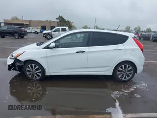 2016 Hyundai Accent Sport with VIN KMHCU5AE4GU249974, listed as a IAAI auction lot 41916351 with 127,692 mi miles. Bid and sale history available at carsss.com. Image 14.