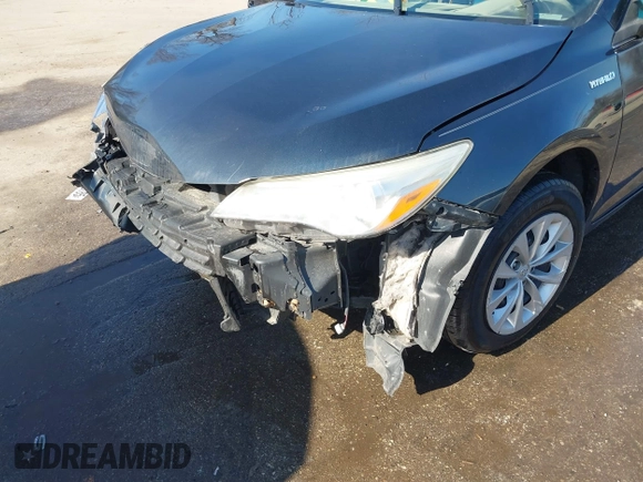 2015 Toyota Camry LE z VIN 4T1BD1FK8FU172673, wystawiony jako IAAI lot #41780228 z przebiegiem 171 308 mil mil oraz . Historia ofert i sprzedaży dostępna na DreamBid. Obrazek 6.