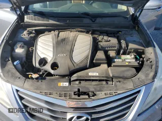 2015 Hyundai Azera z VIN KMHFG4JGXFA483472, wystawiony jako Copart lot #52216745 z przebiegiem 130 758 mil mil oraz Szkoda całkowita • Salvage title. Historia ofert i sprzedaży dostępna na DreamBid. Obrazek 13.