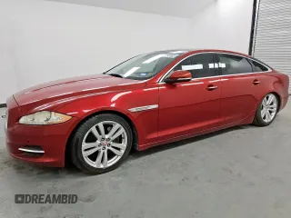2013 Jaguar XJ Portfolio z VIN SAJWA2GB1DLV40103, wystawiony jako Copart lot #57093375 z przebiegiem 126 423 mil mil oraz Czysty tytuł • Clean title. Historia ofert i sprzedaży dostępna na DreamBid. Obrazek 1.